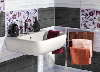 detail of a modern bathroom with sink and accessories