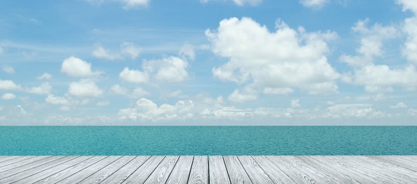 Fototapeta white wooden pier beside sea 