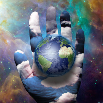 Earth and hand before cosmos