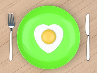 heart fried egg in  plate on wood table
