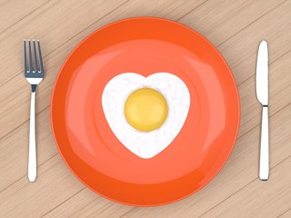 heart fried egg in plate on wood table