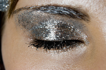 Image of closed eye with beautiful luxury silver eyeshadow - fas