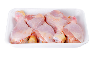Fresh chicken legs isolated on a white
