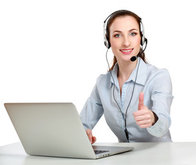 Portrait of business woman working with headset and laptop.