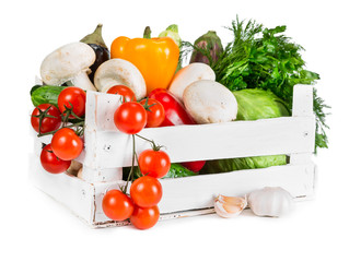 Fresh vegetables in wooden box