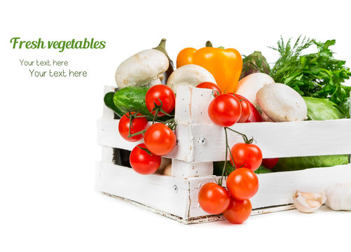Fresh vegetables in a wooden box