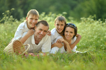 Fototapeta premium Happy family in the summer park