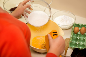 mixing raw eggs in bowl
