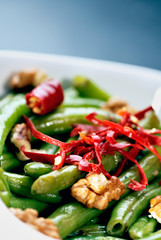 Green bean salad with walnuts and red peppers