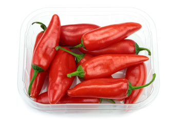 Red hot chili peppers on white background