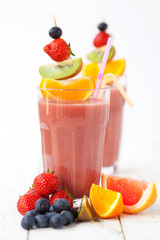 Fresh organic fruit smoothies - shallow dof