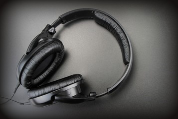 Fototapeta na wymiar Headphones on a black background