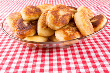 potato patties in a glass dish