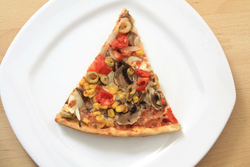 Vegetable pizza slice