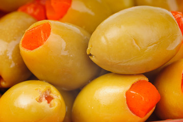 Fototapeta na wymiar stuffed green olives as background