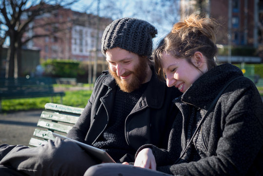 young couple in love using tablet
