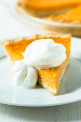 Pumpkin pie with whipped cream