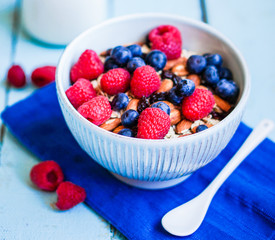 Granola with berries and almonds in a bowl