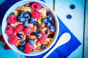 Granola with berries and almonds in a bowl