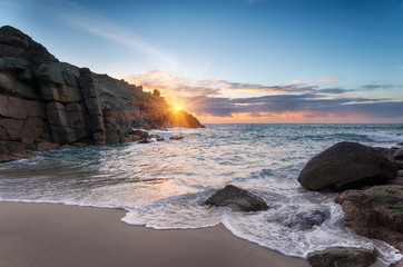 Beautiful Sunrise over a sandy cove