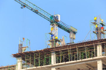 Construction Site with worker on blue sky