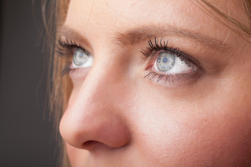 Fototapeta premium Portrait of a pretty girl close up eye
