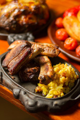Close image of fried pork with potatos