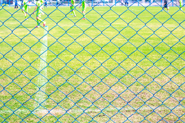 Fototapeta premium wire fence and football yard