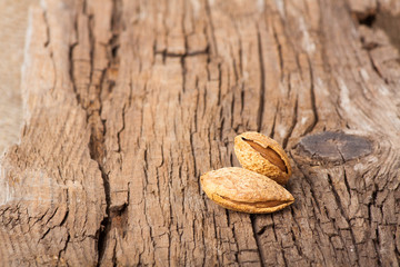 Almonds on wooden board