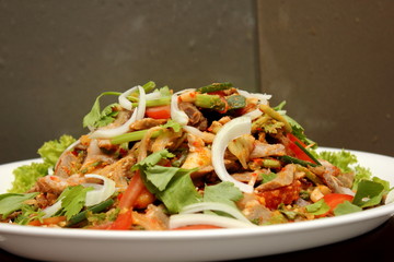 Spicy salad with pork and green herb