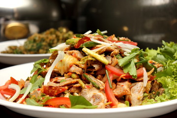 Spicy salad with pork and green herb