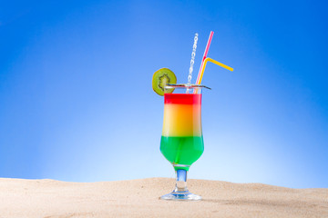 Fresh tropical cocktail on sunny beach