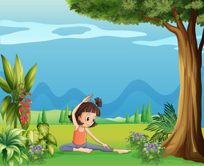 Obraz na płótnie Canvas A young girl doing yoga under the tree