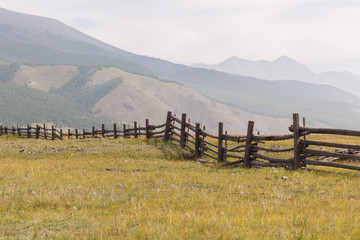 Fence in a mountain valley.