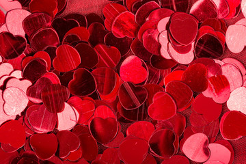 red heart confetti background