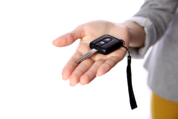 Closeup portrait of a female hand holding car keys