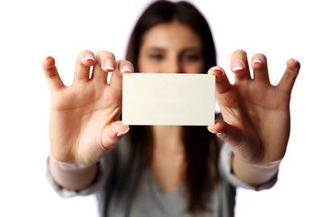 Young businesswoman holding blank business card 