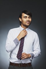 Male model getting ready for work