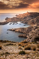 sunset on the Friulian islands, view of the castle and the sea,