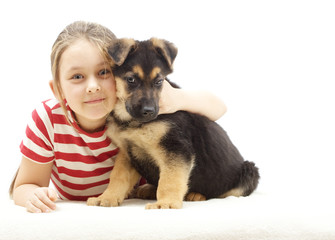 girl together with puppy