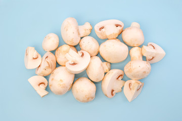 Bunch of mushrooms, a few cut, from a top view