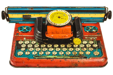 Colorful vintage toy typewriter isolated on white