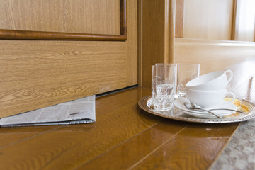 newspaper and used tableware