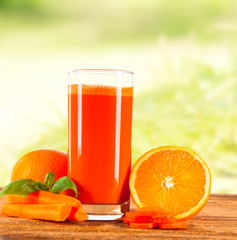 carrot juice on wood 