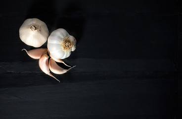 Organic Garlic on a Black Slate