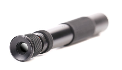 Black spyglass lying.