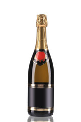 Brown bottle of champagne with golden top.