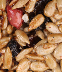 Close up of candied seeds and nuts.