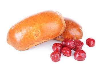 Fresh baked pasties with cherry isolated on white