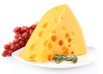 Piece of cheese with grape and rosemary